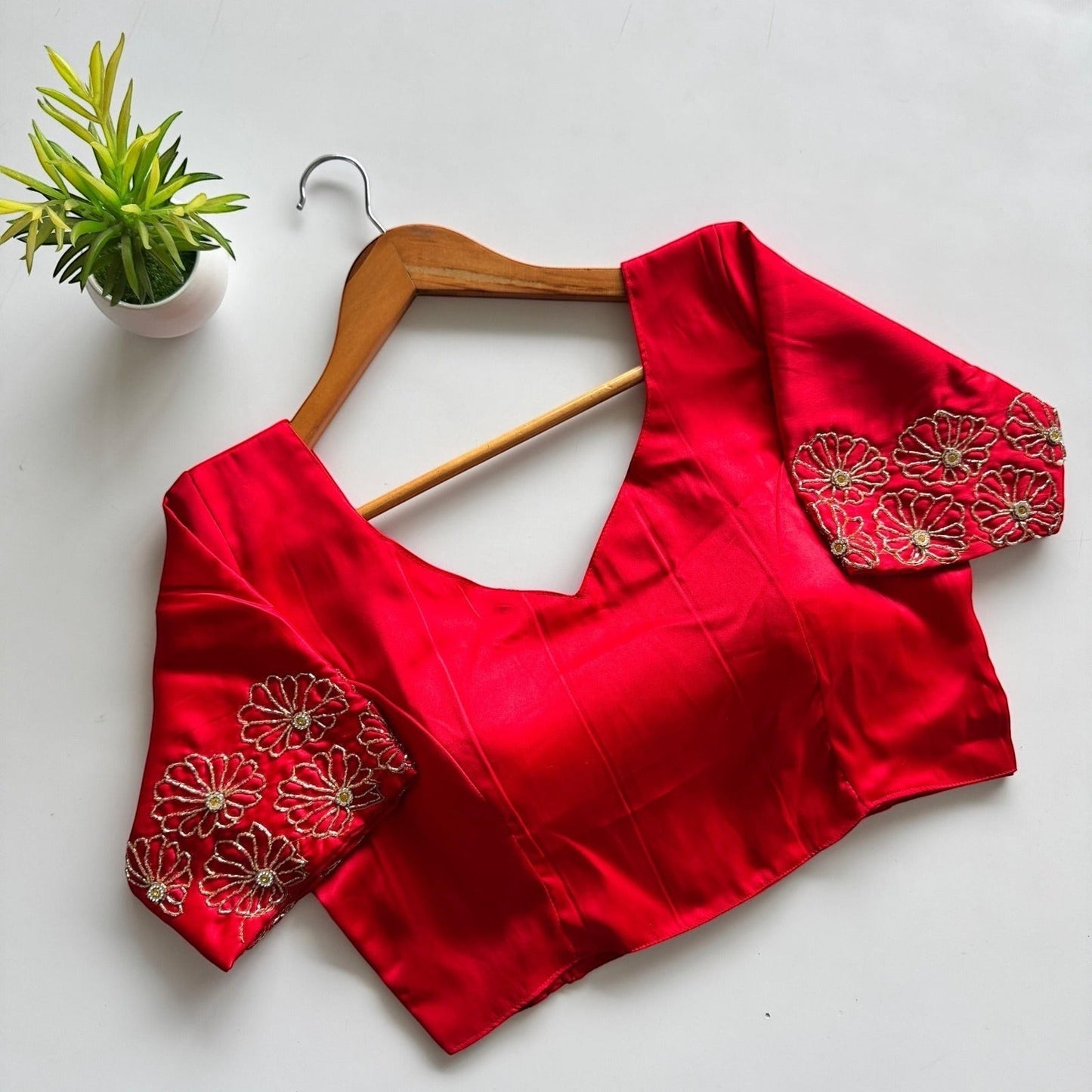 AMAB red Dilruba silk blouse with golden handwork embroidery on sleeves. V-neck, padded, partywear.