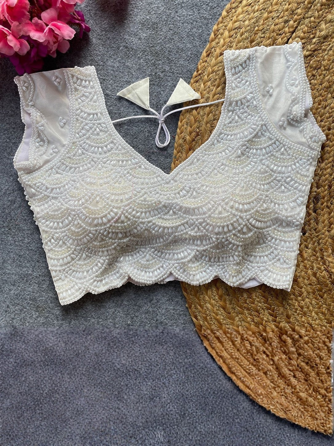 AMAB white pure silk blouse with intricate pearl, bead, and crystal handwork. V-neck, short sleeves, scalloped hem.