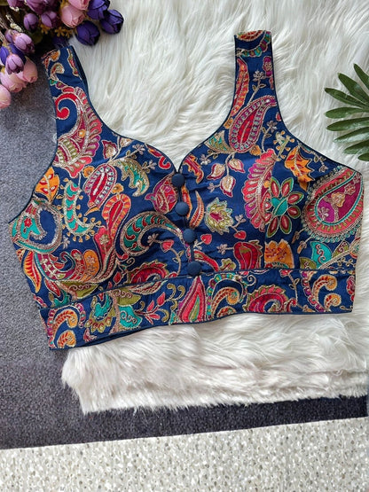 AMA B navy blue sleeveless crepe blouse with colorful paisley embroidery and button front detail.