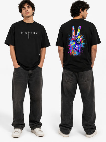 AMAB black 100% cotton crew neck t-shirt with white 'Victory' text on front and colorful peace sign graphic on back.