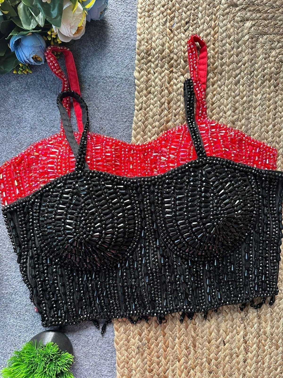 AMAB black sleeveless spaghetti blouse with heavy pearl and beadwork, red spaghetti straps. Back open design.
