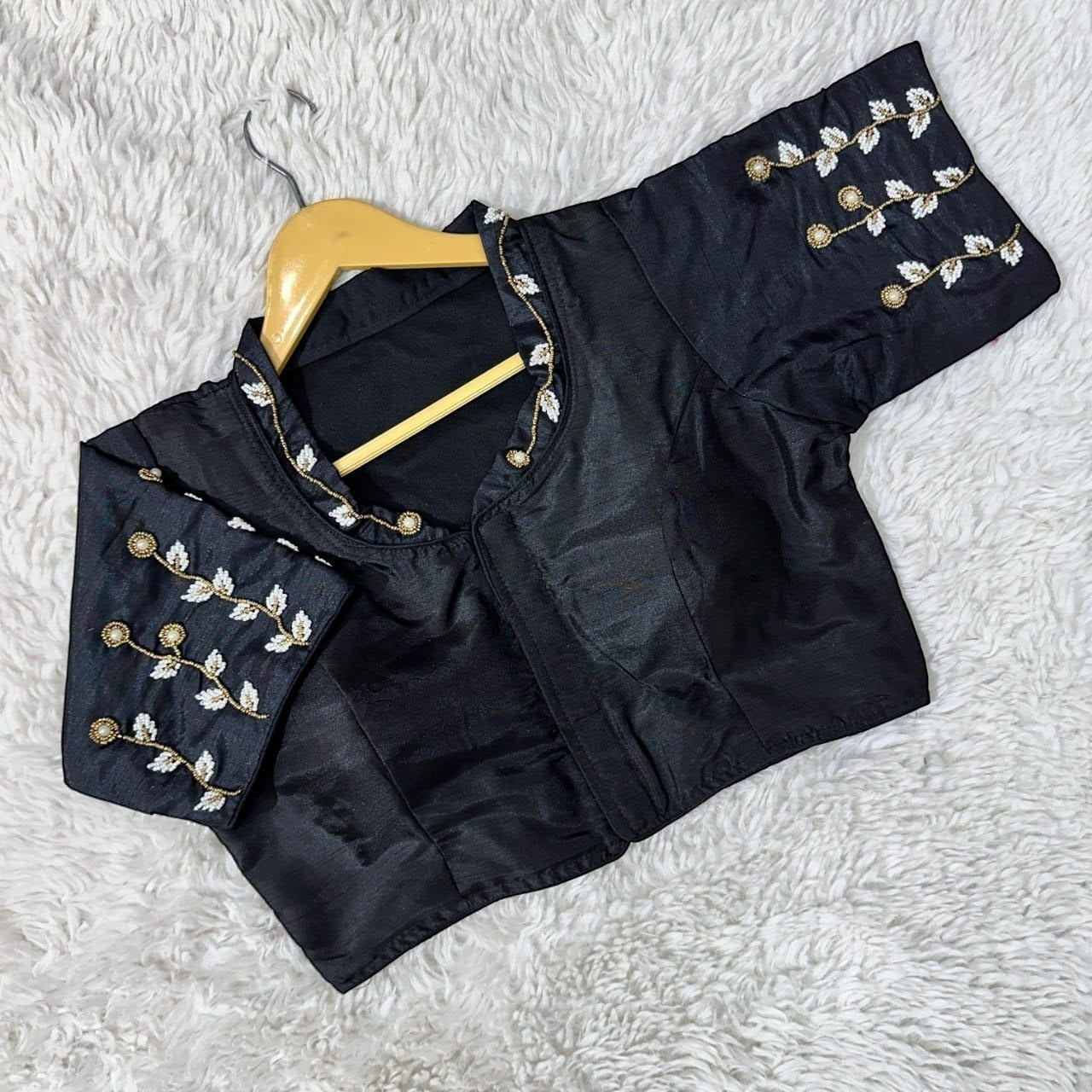 AMAB black silk blouse with embroidered collar and sleeves, featuring gold and white leaf motifs. Padded fit, ideal for partywear.