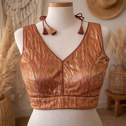 AMAB copper crush pattern soft silk blouse with V-neck and tassel tie-ups, ideal for partywear.