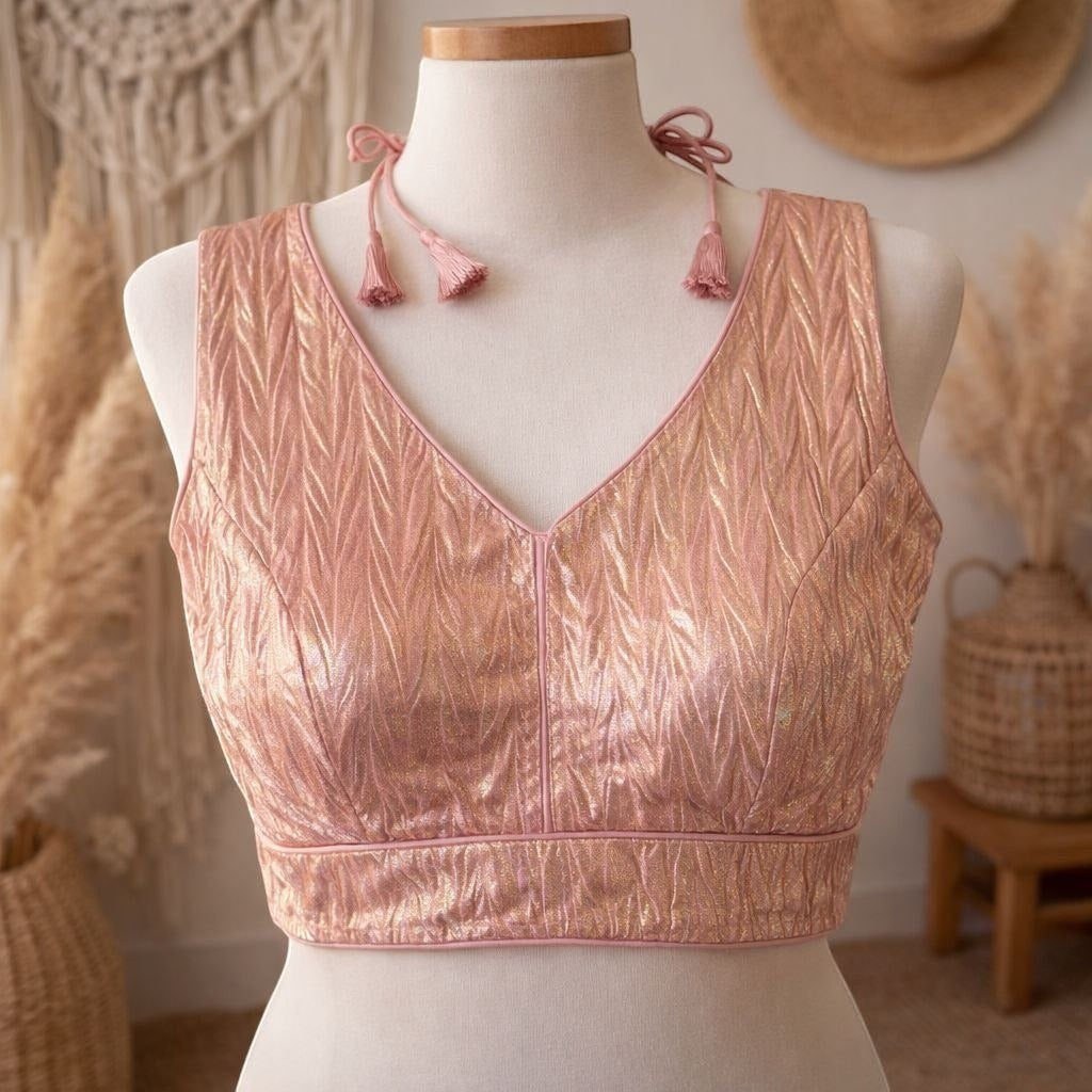 AMAB blush pink crush silk blouse with V-neck and tassel tie straps. Padded design for partywear.