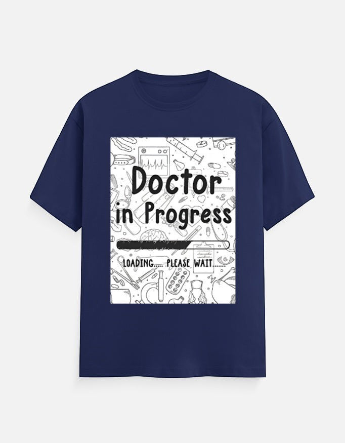 AMAB navy blue cotton t-shirt with "Doctor in Progress Loading Please Wait" graphic and medical icons.