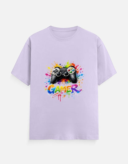 AMAB men's light purple cotton t-shirt with a black video game controller graphic and colorful paint splatters. Text reads "GAMER".