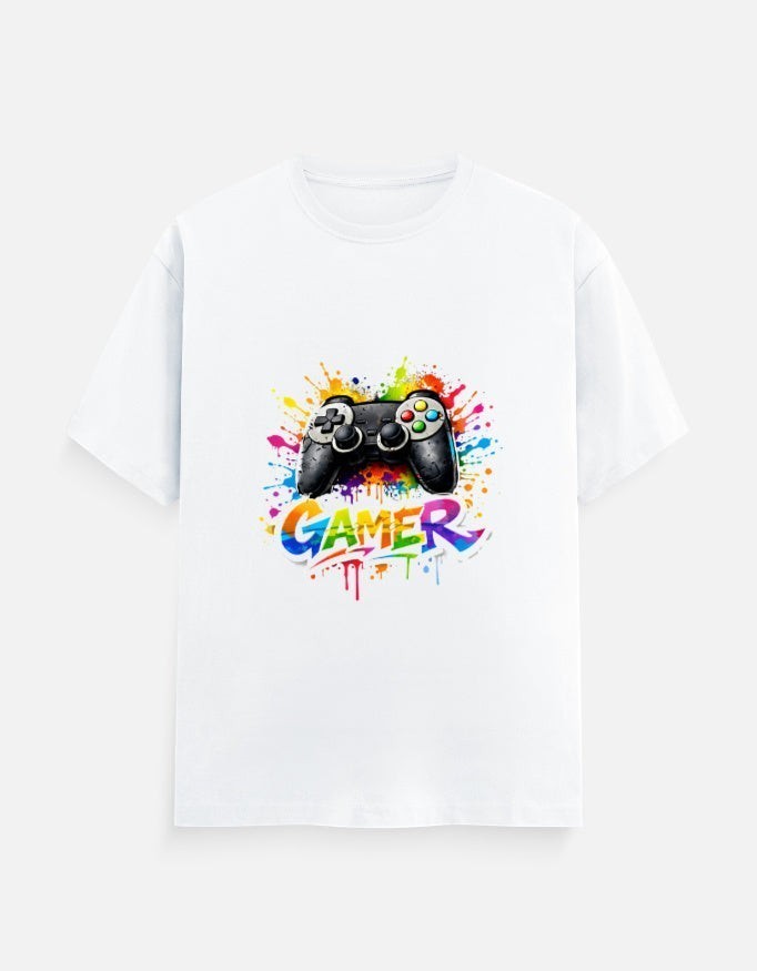 AMAB Men's white cotton t-shirt with a black video game controller graphic and colorful paint splatters. Text reads "GAMER".