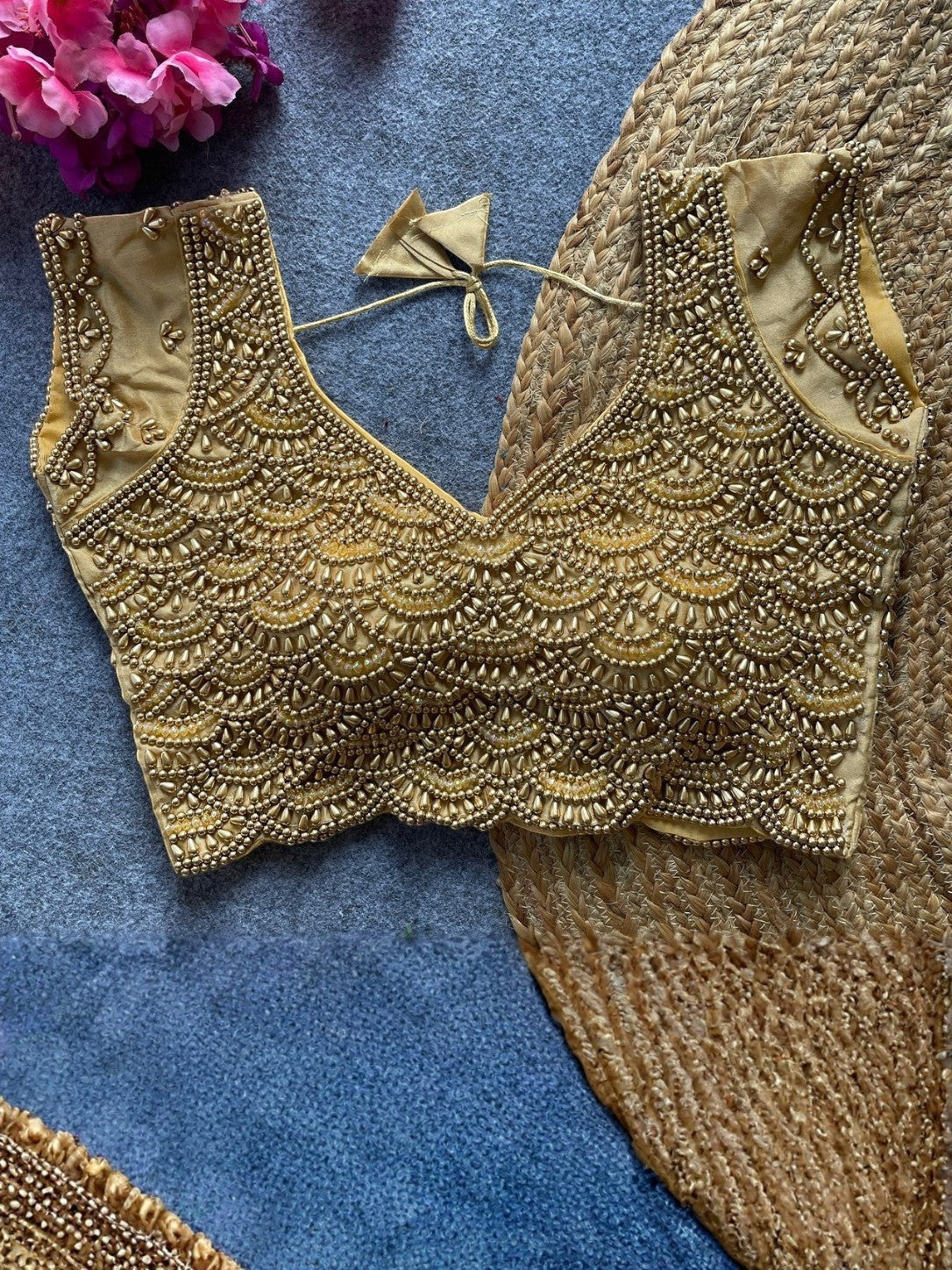 AMAB gold pure silk designer blouse with pearl, bead, and crystal handwork. V-neck, sleeveless, ready-to-wear.