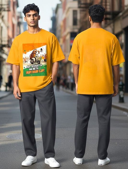 AMA B Graphic Print Oversized Cotton T-Shirt in yellow, featuring a cartoon cockroach on a scooter with a megaphone.