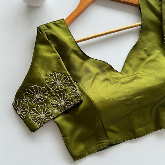AMAB green Dilruba silk blouse with golden handwork floral embroidery on sleeves and V-neckline. Premium partywear.