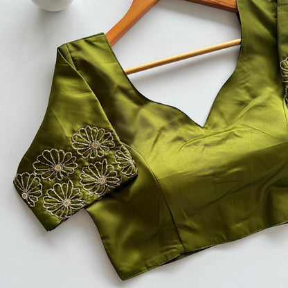 AMAB green Dilruba silk blouse with golden handwork floral embroidery on sleeves and a deep V-neck. Premium partywear.