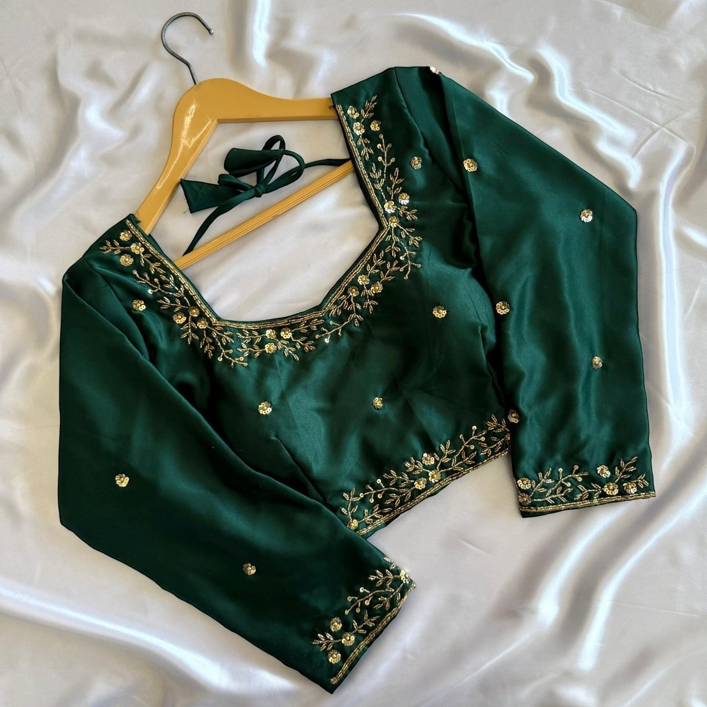 AMAB designer deep green Kimora silk blouse with golden handwork and sequence detailing, 3/4 sleeves, padded, square neck.