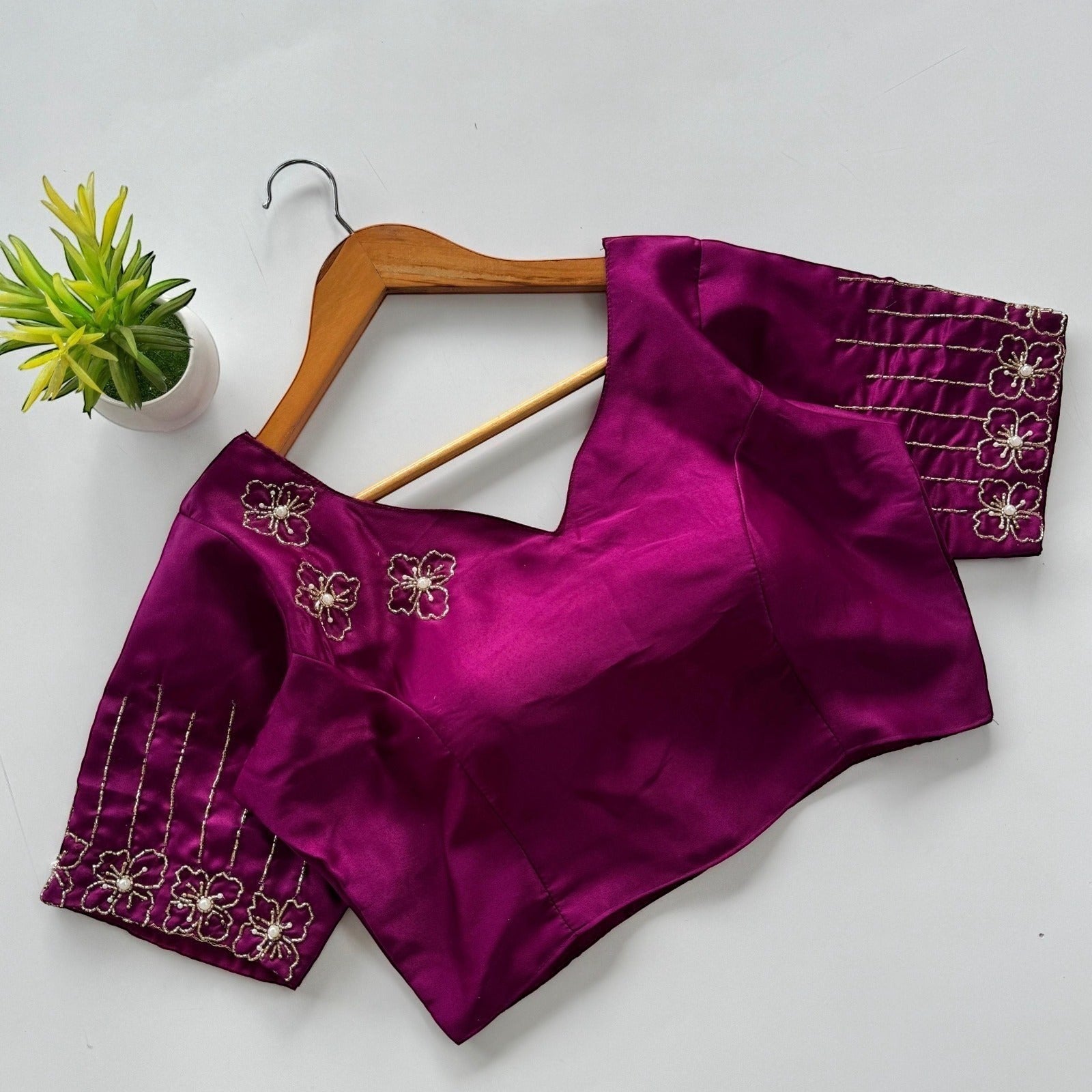 AMAB elegant magenta Dilruba silk blouse with golden handwork floral embroidery on sleeves and neckline. Padded partywear.