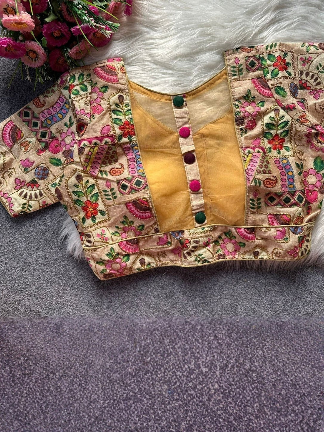 AMAB beige Malai silk blouse with multi-color floral embroidery and decorative front buttons. Elbow-length sleeves.