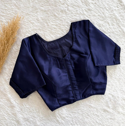 AMAB navy blue pure silk padded designer blouse with elastic fit and decorative sleeve cuffs.