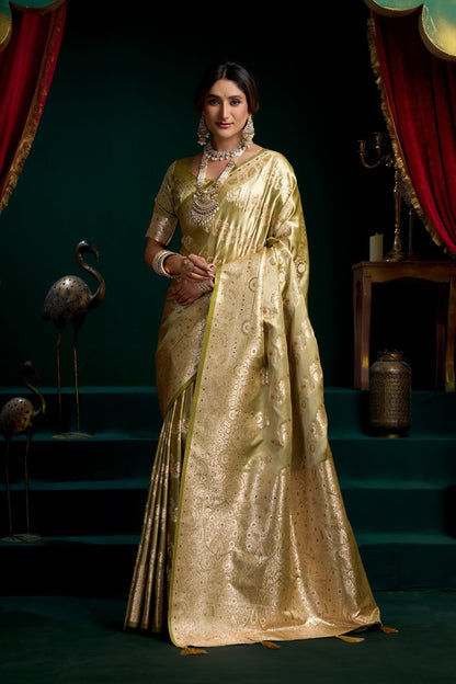 AMAB Traditional olive green silk blend saree with intricate zari weaving and gold motifs. Includes matching blouse.