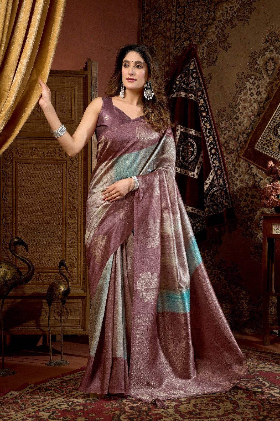 AMAB women's plum silk blend saree with woven floral motifs and metallic threads, featuring a blue border.