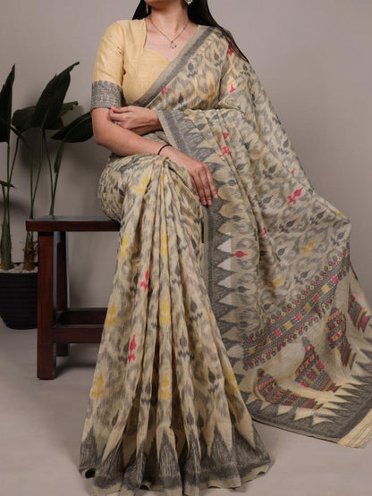 AMAB cream and grey ikat printed cotton saree with pink and yellow accents, paired with a light yellow blouse.
