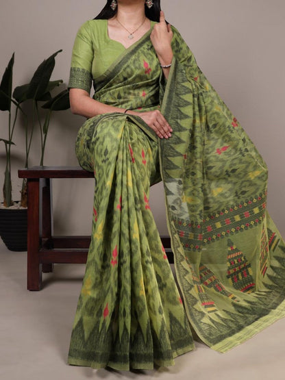 AMAB green cotton saree with all-over abstract print and decorative border, paired with matching blouse.