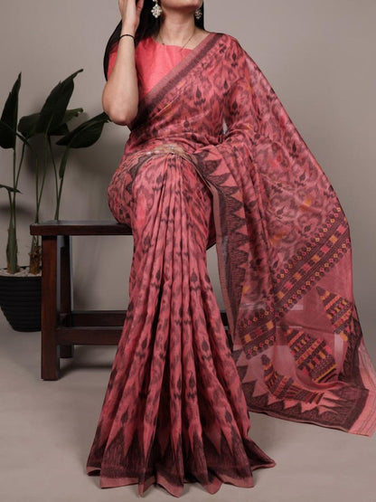 AMAB pink cotton saree with all-over ikat-style print and embroidered border, includes blouse piece.