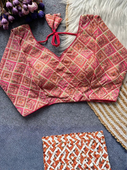 AMAB pink and gold printed silk blouse with V-neck and tie closure. Perfect for ethnic wear.