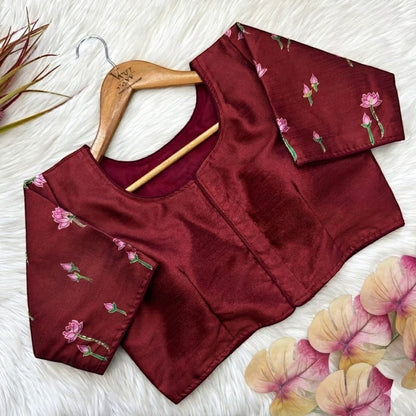 AMAB pure silk maroon blouse with lotus print and antique handcrafted work on sleeves. Elegant ethnic wear.