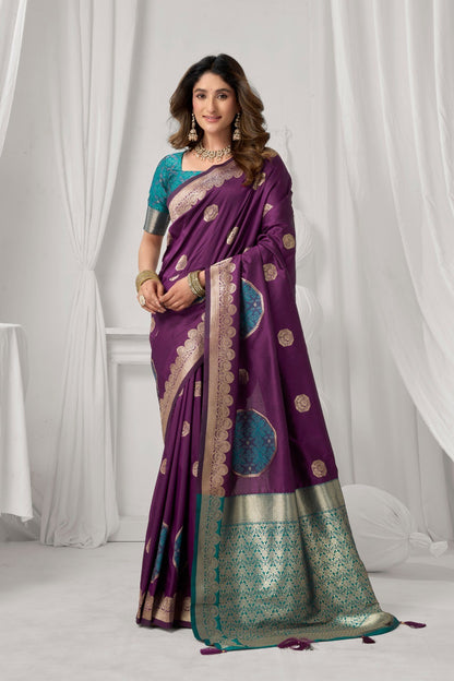 AMAB purple Kanjeevaram silk saree with gold and teal intricate border and circular motifs. Model wears teal blouse.