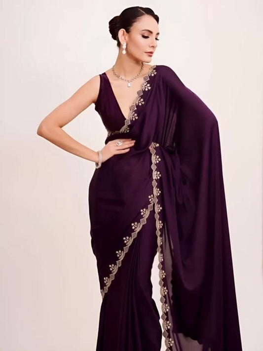AMAB deep purple silk blend saree with gold embroidered floral border and matching blouse.