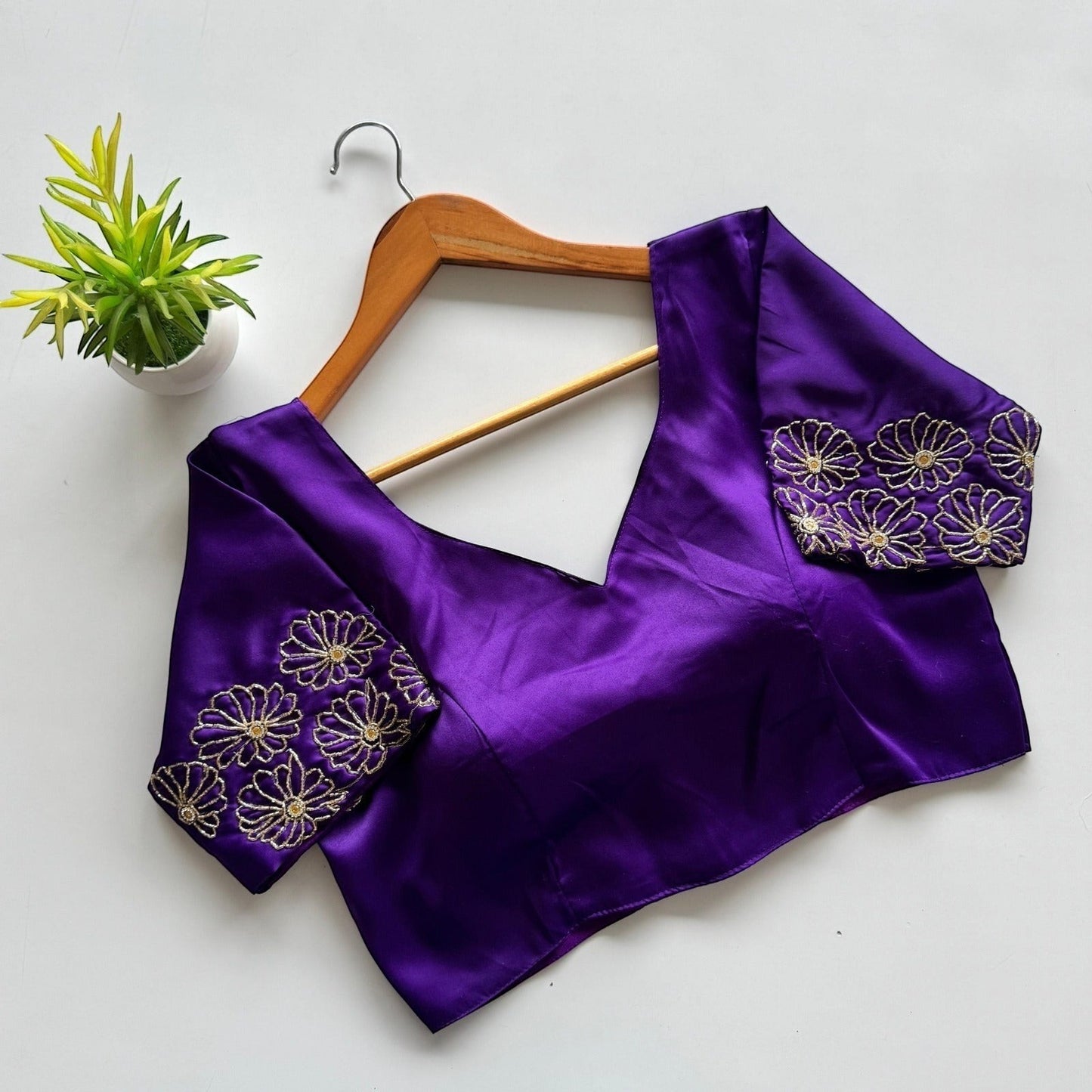 AMAB purple Dilruba silk blouse with golden handwork embroidery on sleeves and neckline. V-neck, padded, partywear.