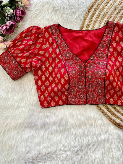 AMAB red and gold Ajrakh print cambric cotton blouse with puff sleeves and front open design.