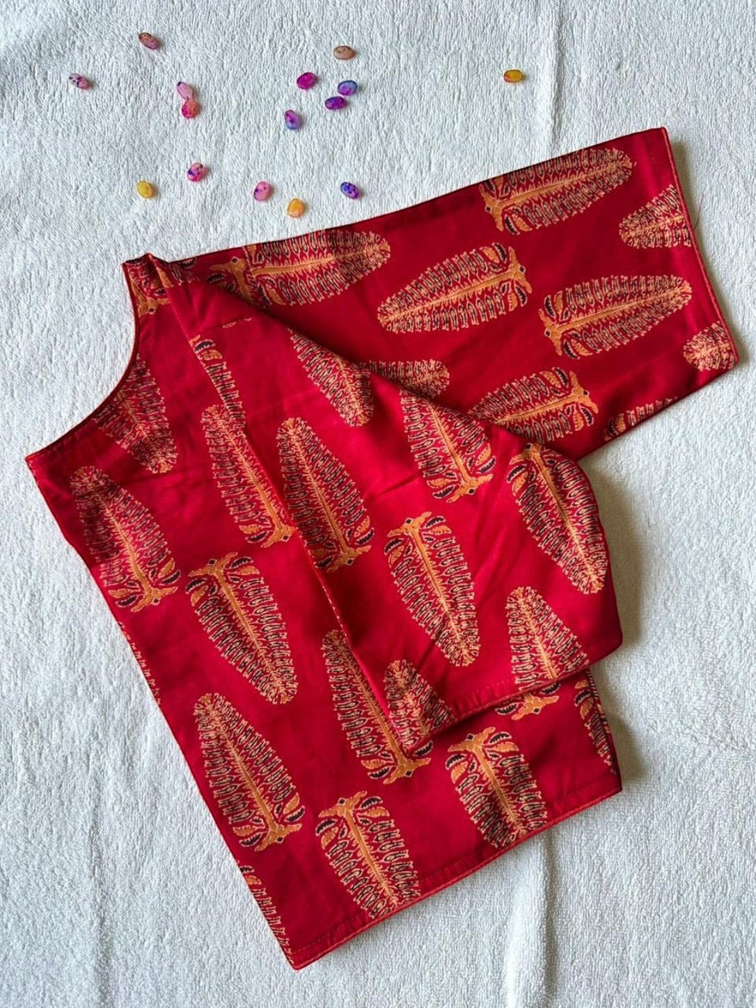 AMAB red pure cotton Ajrakh handblock print blouse with boat neck and elbow sleeves.