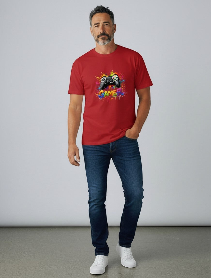 AMAB red cotton t-shirt with graphic print of a video game controller and colorful paint splatters.