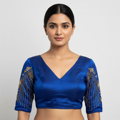 AMAB designer royal blue soft silk blouse with intricate gold handwork on sleeves and padded V-neck. Partywear.