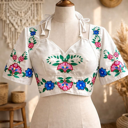 AMAB white semi pure silk blouse with colorful floral embroidery and antique handcrafted work. Halter neck with short sleeves.