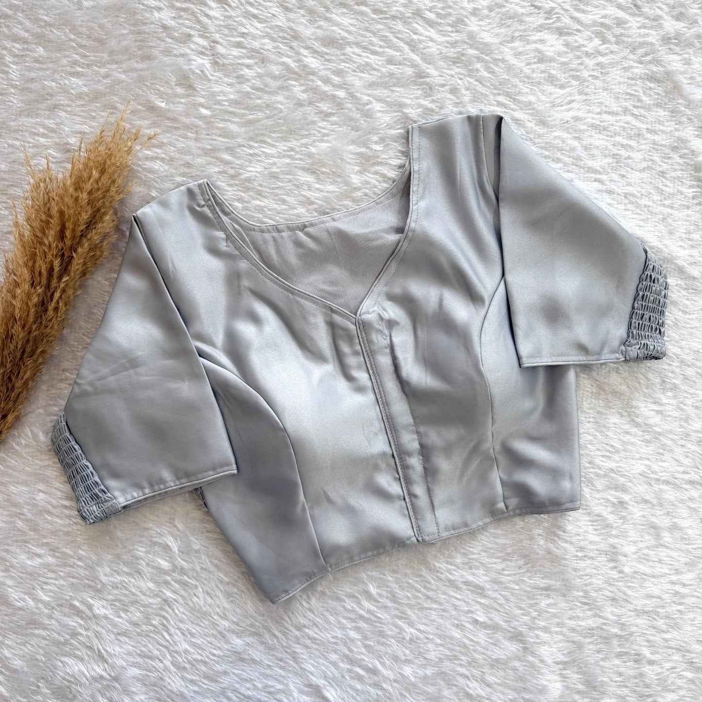 AMAB silver pure silk blouse with elastic fit and padded comfort. V-neck, short sleeves with smocked cuffs.