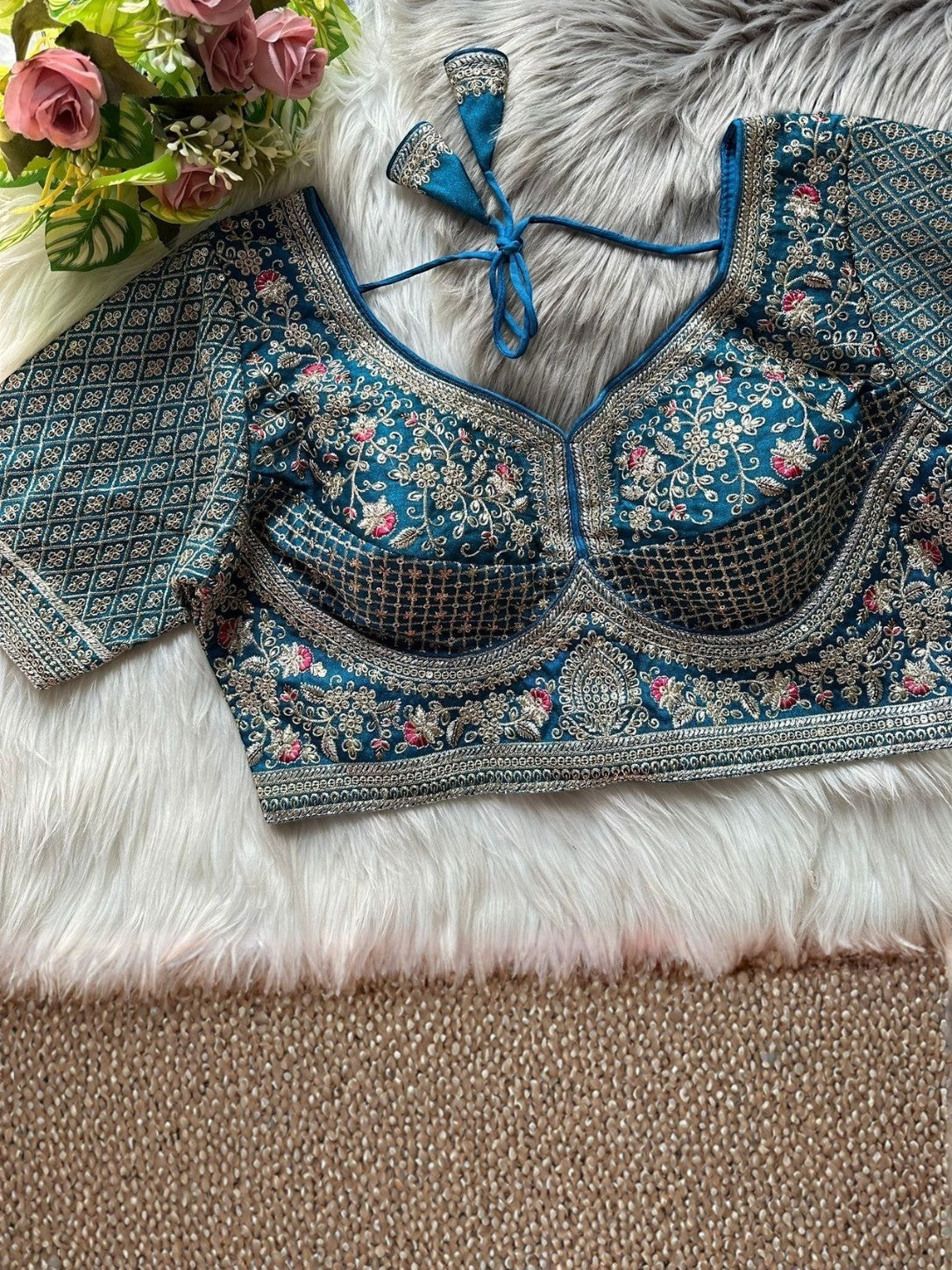AMAB Sabyasachi-inspired teal Roman silk bridal blouse with gold zari, sequence embroidery, and back tie closure.
