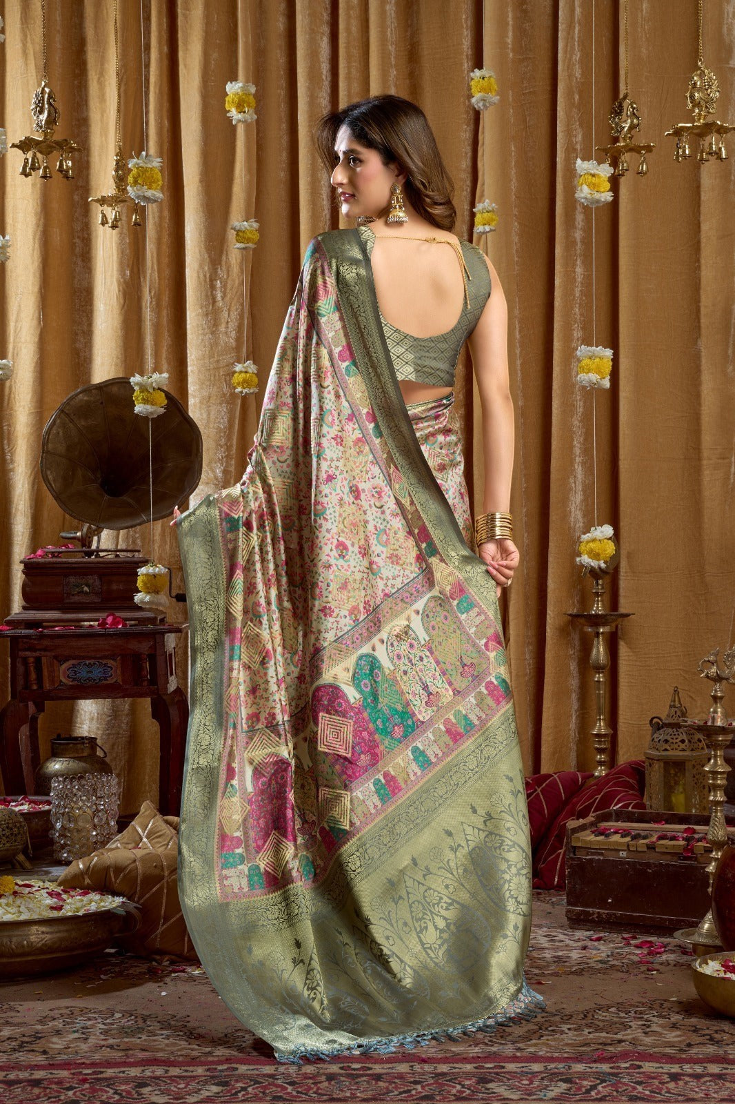 AMAB Traditional Indian Silk Sari in cream with intricate weave, featuring colorful motifs and a gold border. Draped on a model.