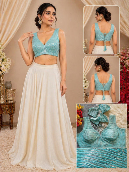 AMAB heavy deep neck partywear blouse in turquoise with embroidery and sequence work, back tie closure.