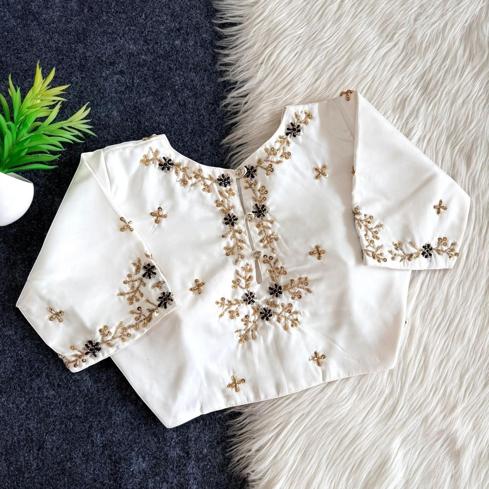 AMAB white butter silk blouse with heavy gold and black handwork on back and sleeves, padded partywear.