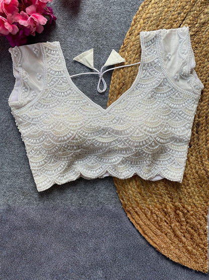 AMAB white pure silk blouse with intricate pearl, bead, and crystal handwork. V-neck, short sleeves, scalloped hem.