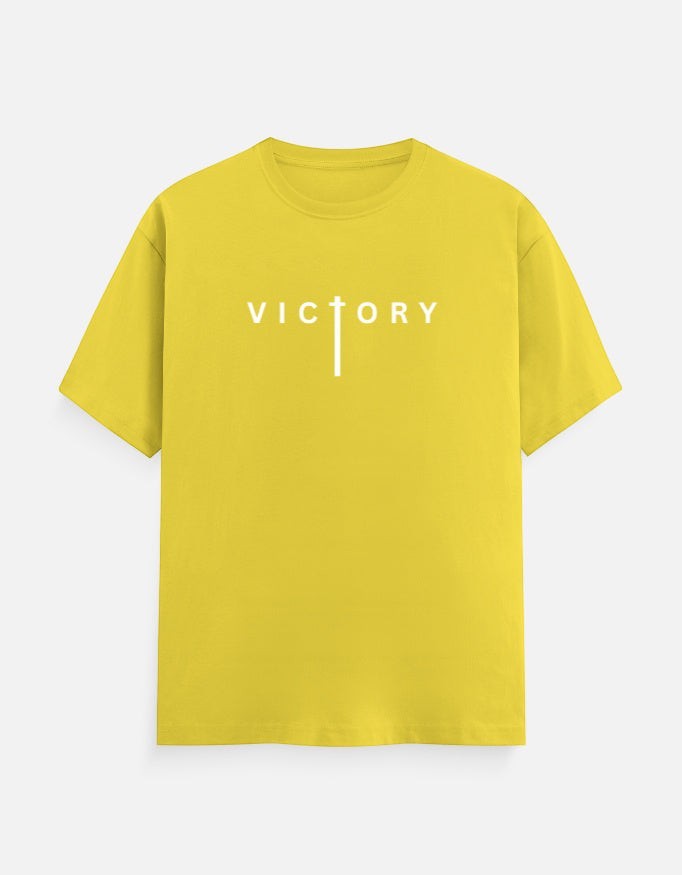 AMAB yellow 100% cotton crew neck t-shirt with white 'Victory' typography on the front.