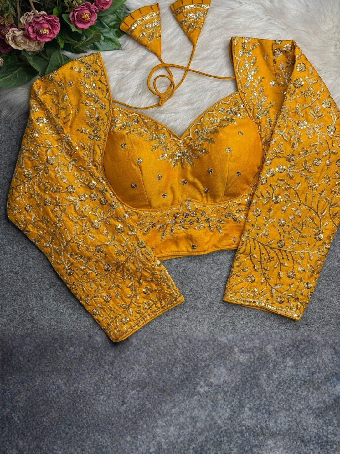 AMAB yellow heavy Vichitra silk blouse with long sleeves, jari and sequence embroidery, and back open design.